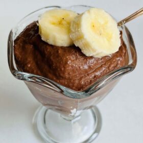 Banana dark chocolate mousse in a glass dish.