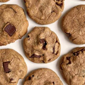 Cookies made with sunflower seed butter on a white plate.